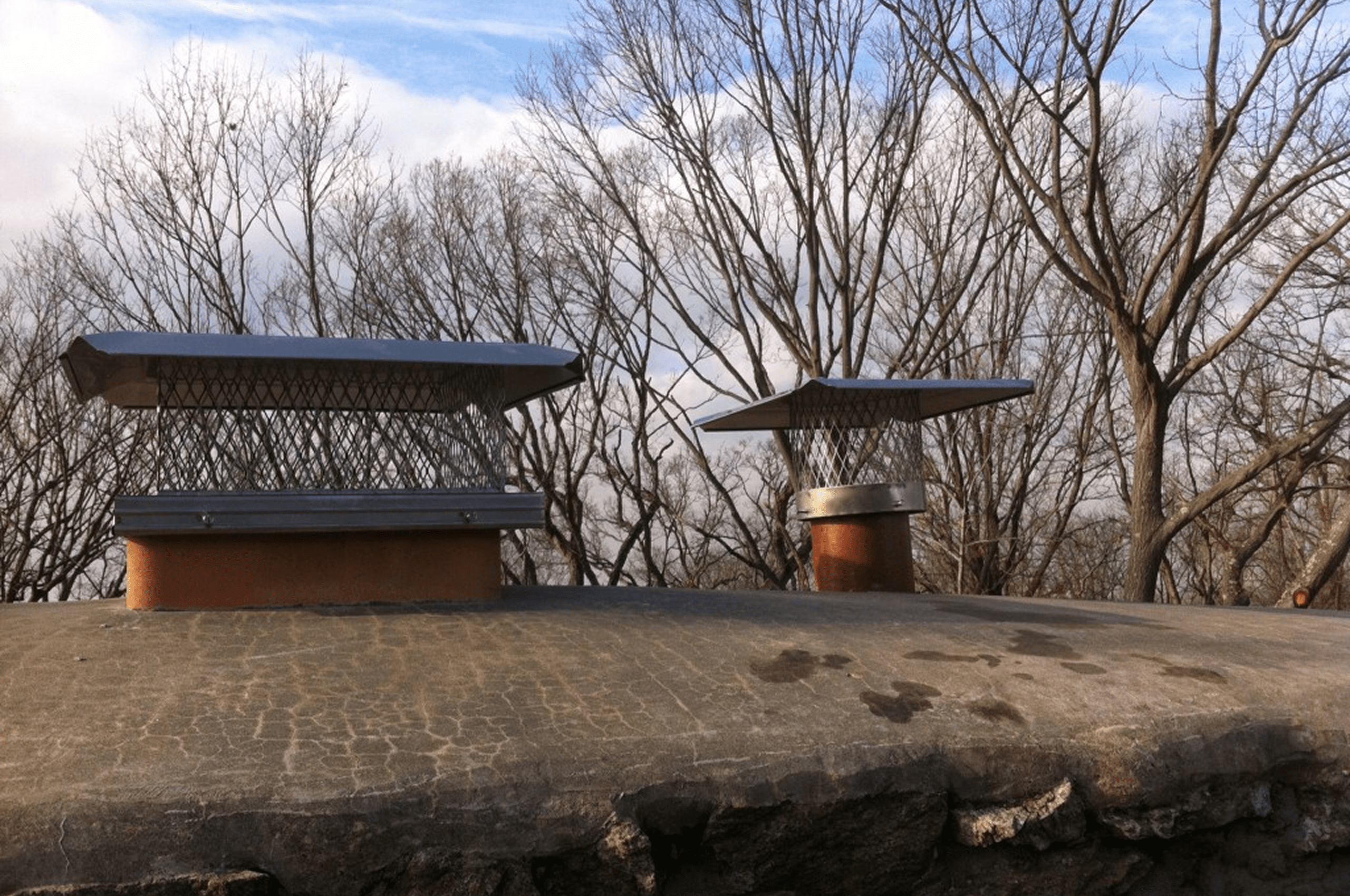 Chimney caps on a rooftop